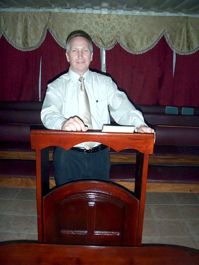 Behind the pulpit